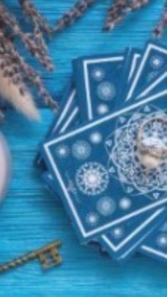 Image of Cards  and a Candle.