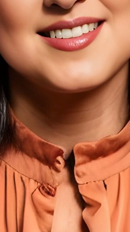 Image of me in an Orange Shirt.